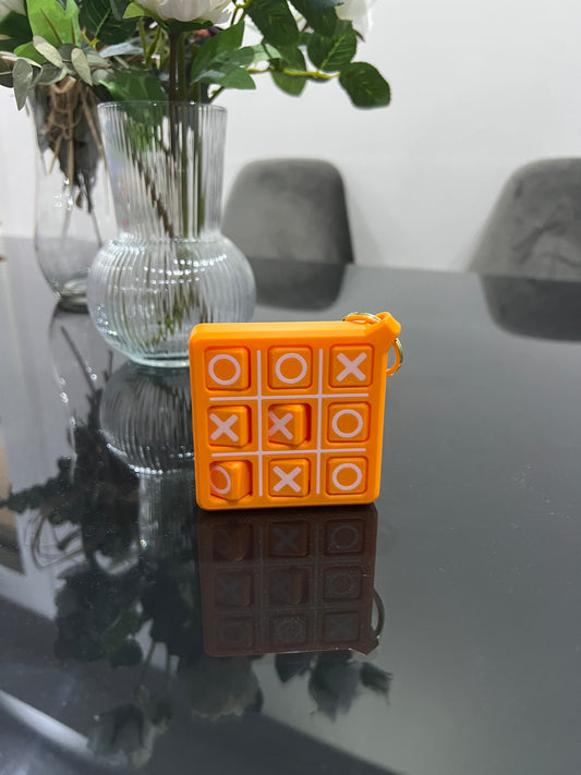 TicTac Twist Anahtarlık Oyunu – Döner Taşlı Mini Zeka Bulmacası